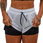 Shorts Elite Motion 2 em 1 Feminino | Compressão Interna, Bolso Oculto e Performance Premium